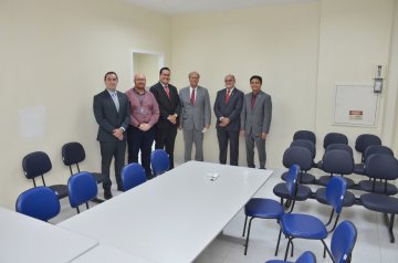 Foto da Diretoria do Nupemec sendo recebida pela direção da Faculdade Estácio